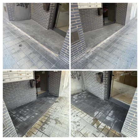 Sustitución de escalón por rampa accesible en entrada de edificio